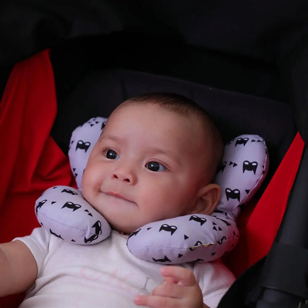 Almohada de apoyo para cabeza y cuello en forma de U para bebés, ideal para viajes.